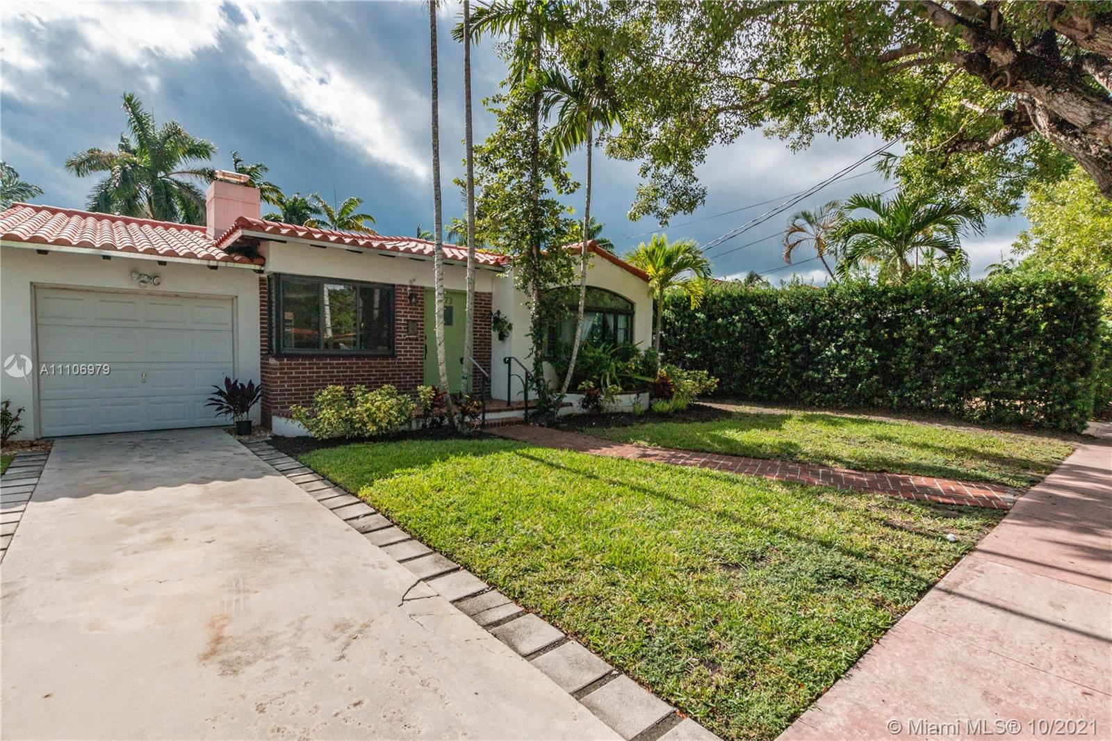 5173 Alton Road Miami Beach, FL 33140 - Photo 31 of 31 a front view of a house with garden
