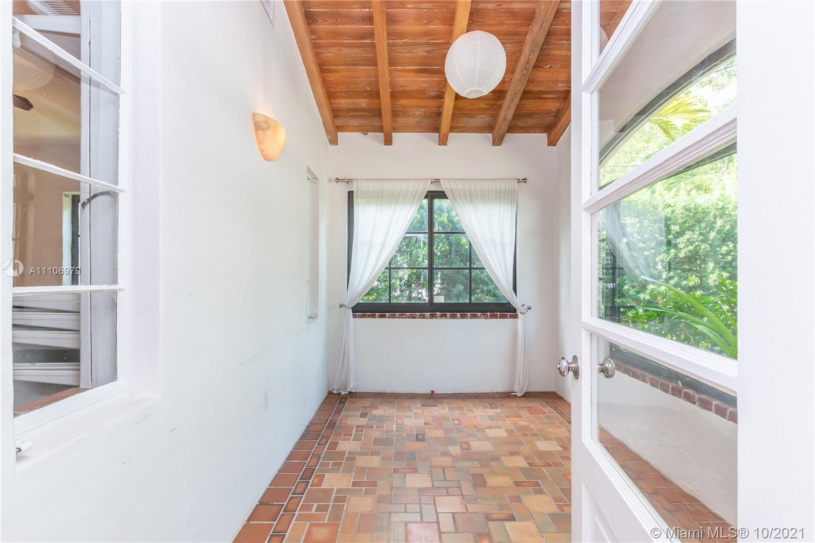 5173 Alton Road Miami Beach, FL 33140 - Photo 9 of 31 a view of a hardwood & staircase