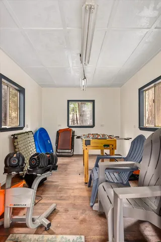 a view of a yard with large trees