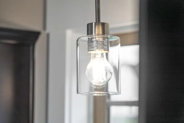 a close view of light fixtures and entryway