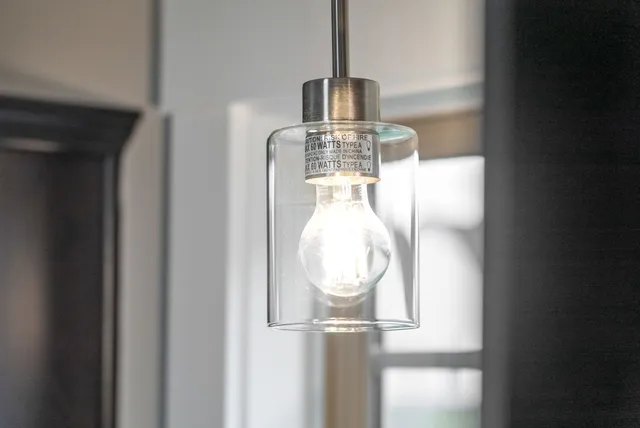 a close view of light fixtures and entryway