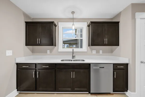 a bathroom with a sink double vanity and a mirror