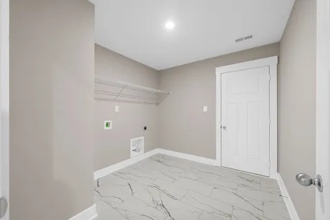 a view of an house with backyard space and balcony