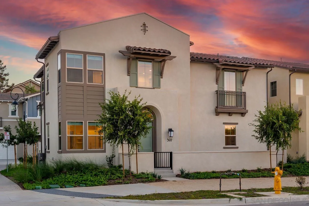 597 Townsend Way San Marcos, CA 92078 - Photo 1 of 30 a front view of a house with a yard and garage