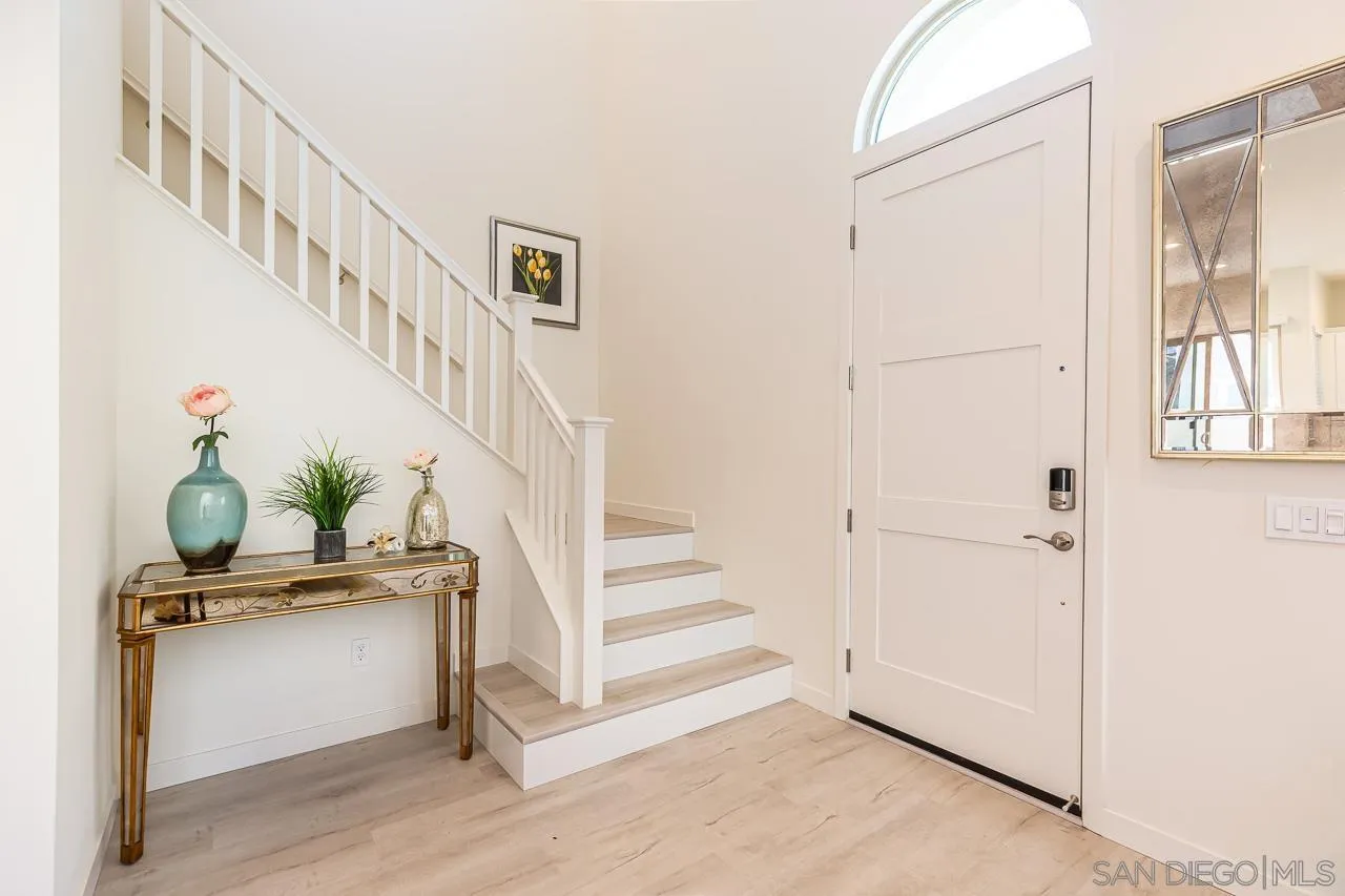 597 Townsend Way San Marcos, CA 92078 - Photo 14 of 30 a view of entryway and hall with wooden floor