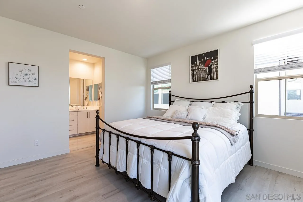 597 Townsend Way San Marcos, CA 92078 - Photo 18 of 30 a bedroom with a bed and a window