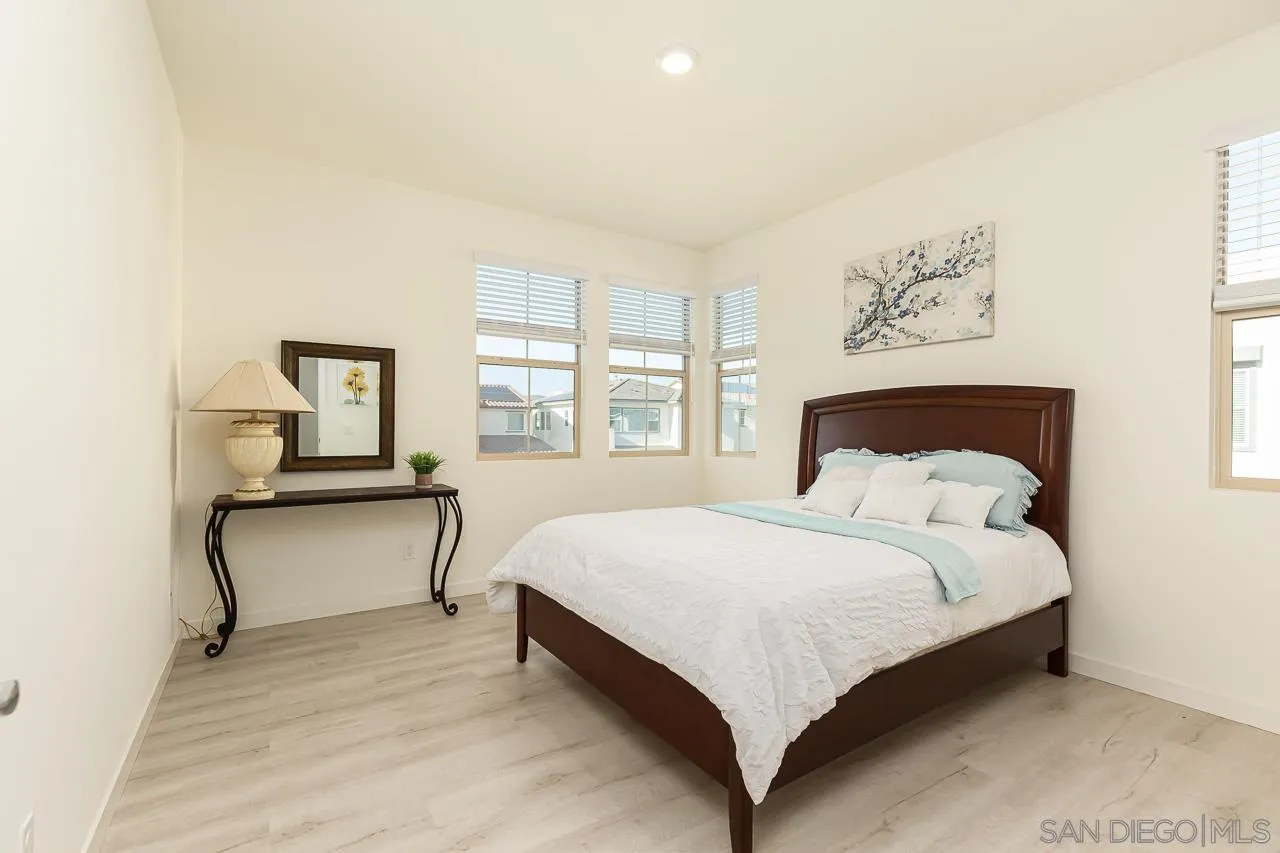 597 Townsend Way San Marcos, CA 92078 - Photo 24 of 30 a bedroom with a bed and window