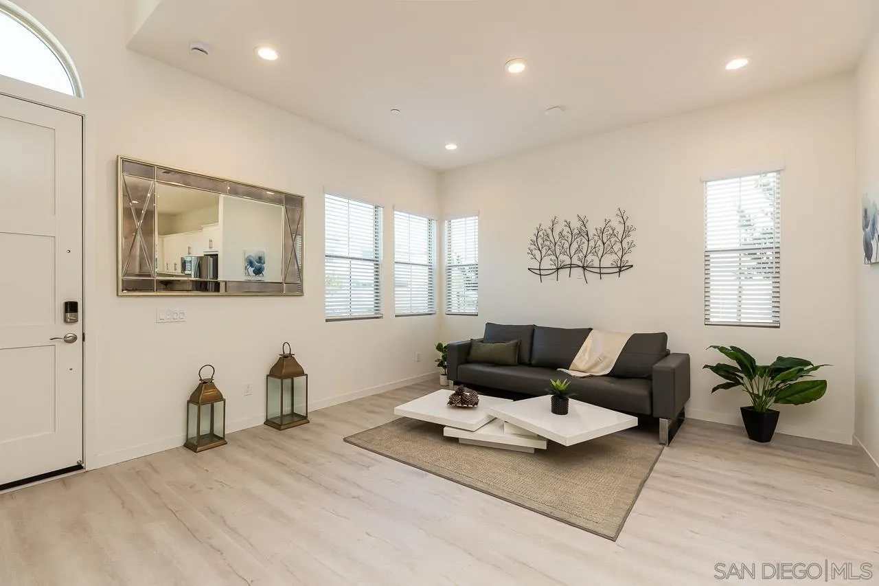 597 Townsend Way San Marcos, CA 92078 - Photo 5 of 30 a living room with furniture and wooden floor