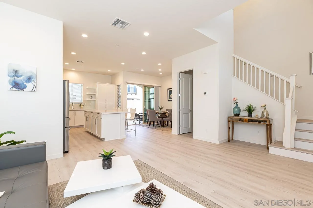 597 Townsend Way San Marcos, CA 92078 - Photo 7 of 30 a living room with furniture and wooden floor