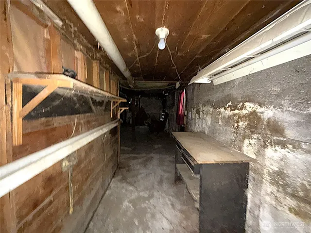 a view of a room with wooden furniture