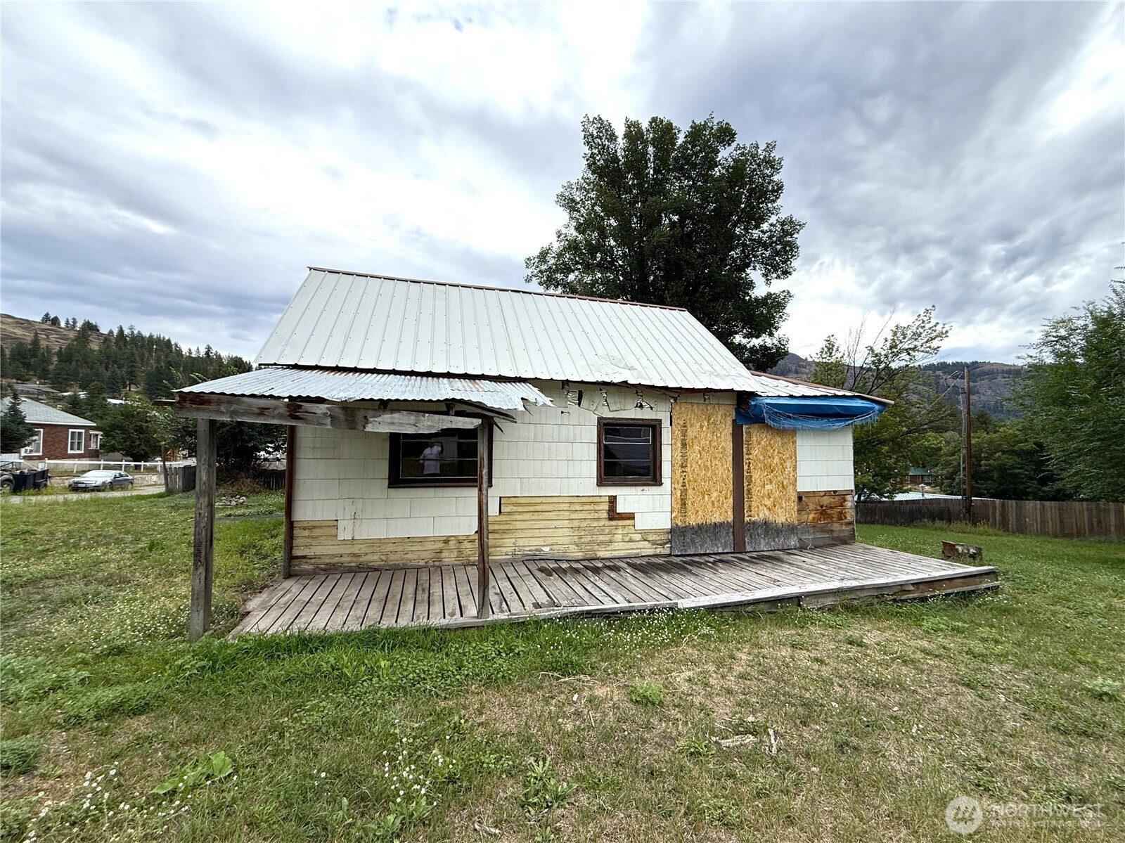 653 East 9th Street Republic, WA 99166 - Photo 4 of 23 a view of a backyard with plants and a garden