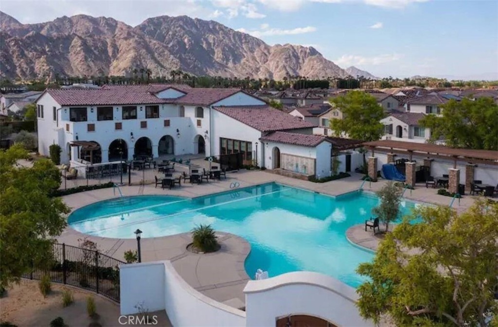 80281 Redstone Way La Quinta, CA 92253 - Photo 21 of 21 a swimming pool view with a outdoor seating