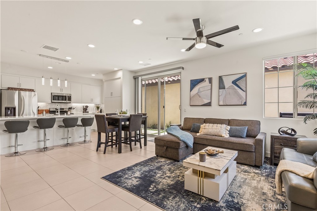 80281 Redstone Way La Quinta, CA 92253 - Photo 3 of 21 a living room with lots of furniture and a view of kitchen
