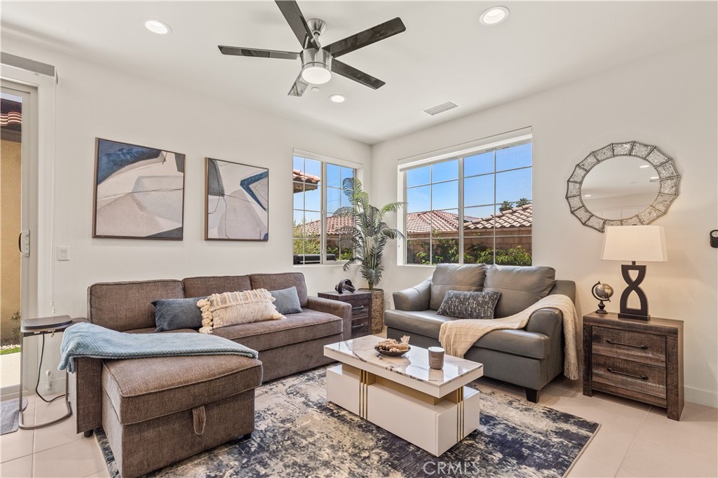 80281 Redstone Way La Quinta, CA 92253 - Photo 4 of 21 a living room with furniture a rug and a window