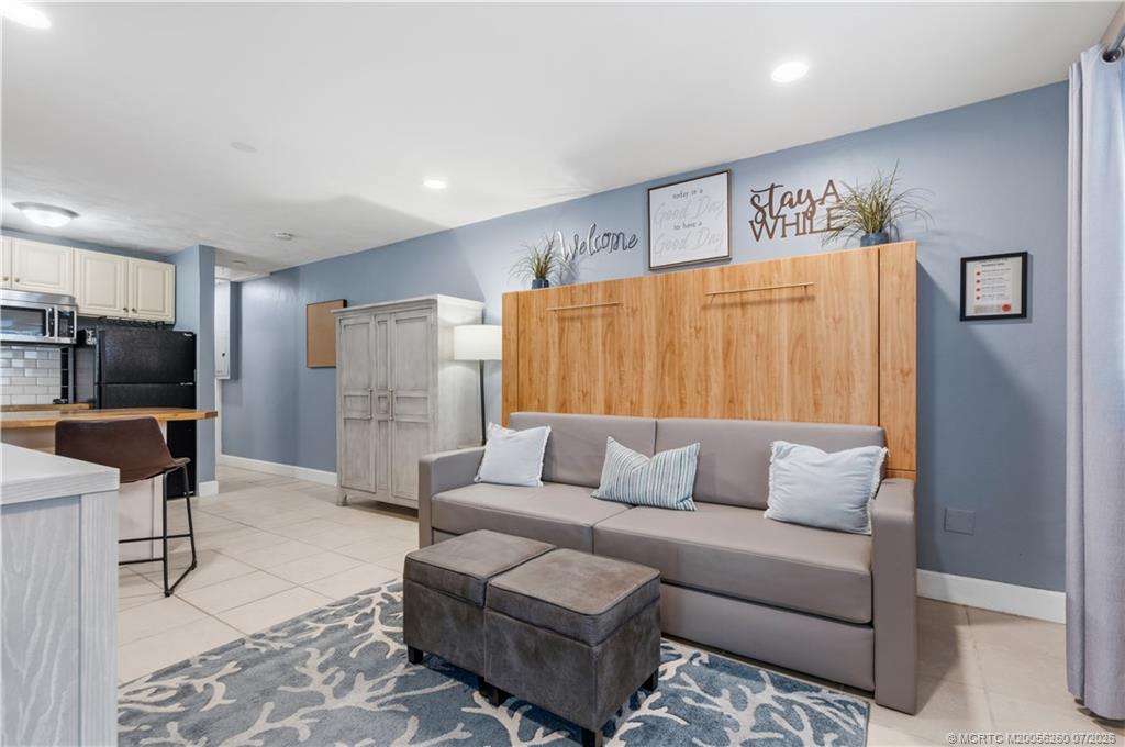 657 Southwest Cleveland Avenue Stuart, FL 34994 - Photo 5 of 34 Unit A Murphy Bed/Family Room