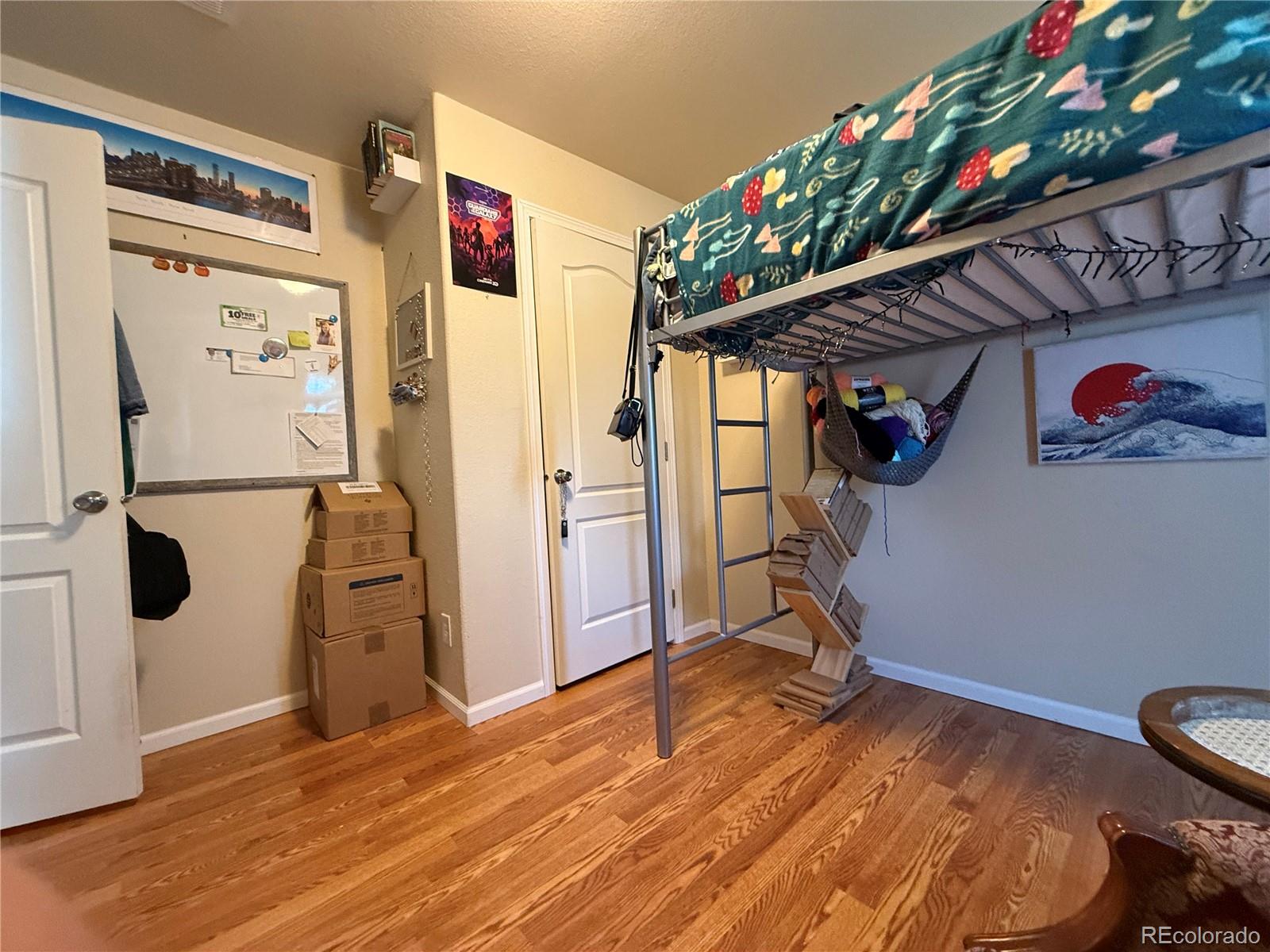 17190 Mt Vernon Road Golden, CO 80401 - Photo 12 of 21 a view of a hallway with wooden floor and entryway