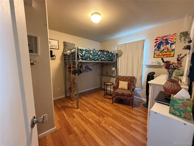 a bedroom with furniture and a bed