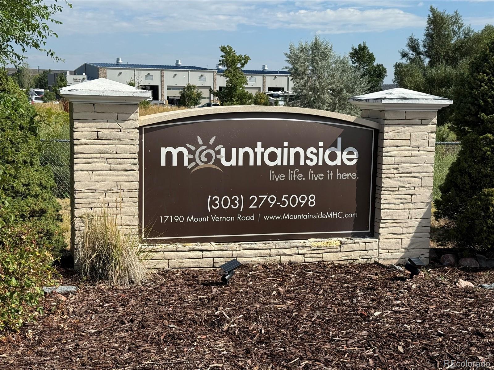 17190 Mt Vernon Road Golden, CO 80401 - Photo 21 of 21 a sign on the side of a building