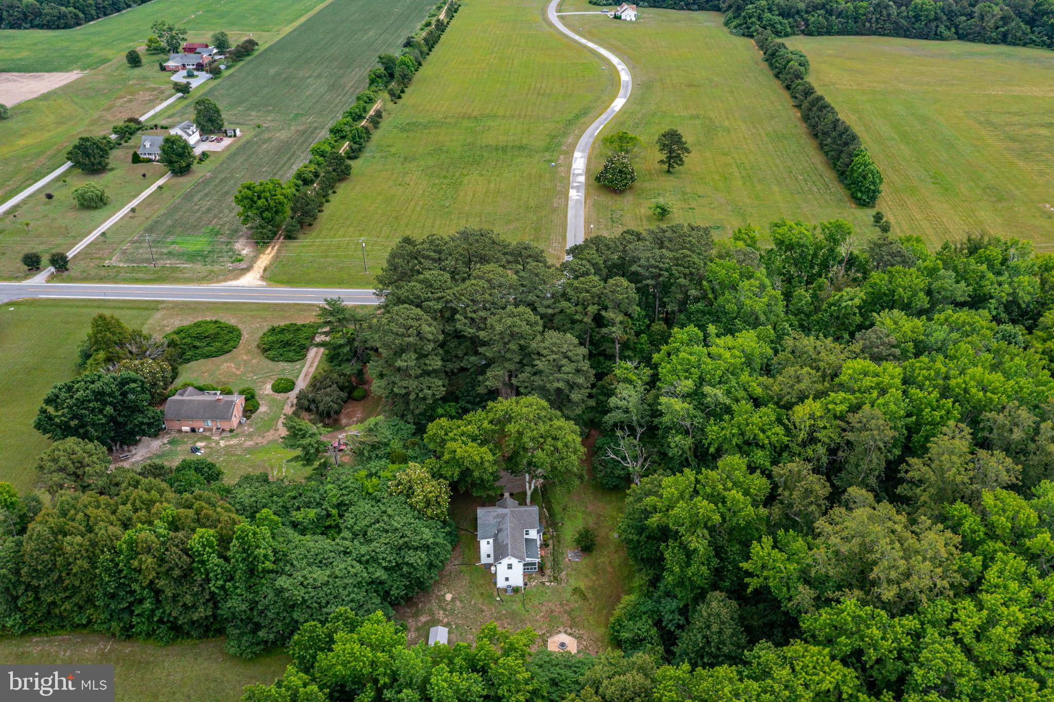 3952 Irvington Road Irvington, VA 22480 - Photo 48 of 77 an aerial view of a residential houses with outdoor space and swimming pool