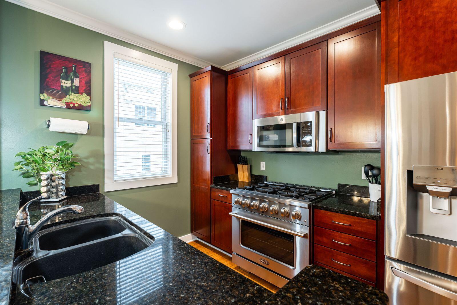 1847 Vel R. Phillips Avenue, Unit B Milwaukee, WI 53212 - Photo 8 of 38 Kitchen w/ SS Appliances