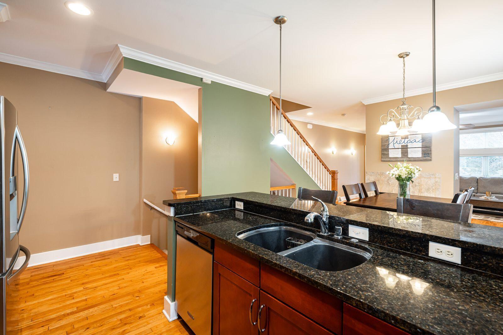 1847 Vel R. Phillips Avenue, Unit B Milwaukee, WI 53212 - Photo 9 of 38 Kitchen with Breakfast Bar