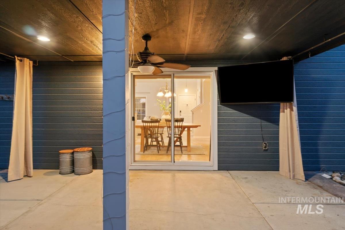 80 Cobblestone Court Middleton, ID 83644 - Photo 30 of 48 Covered patio with recessed lighting, ceiling fan, and mounted outdoor television