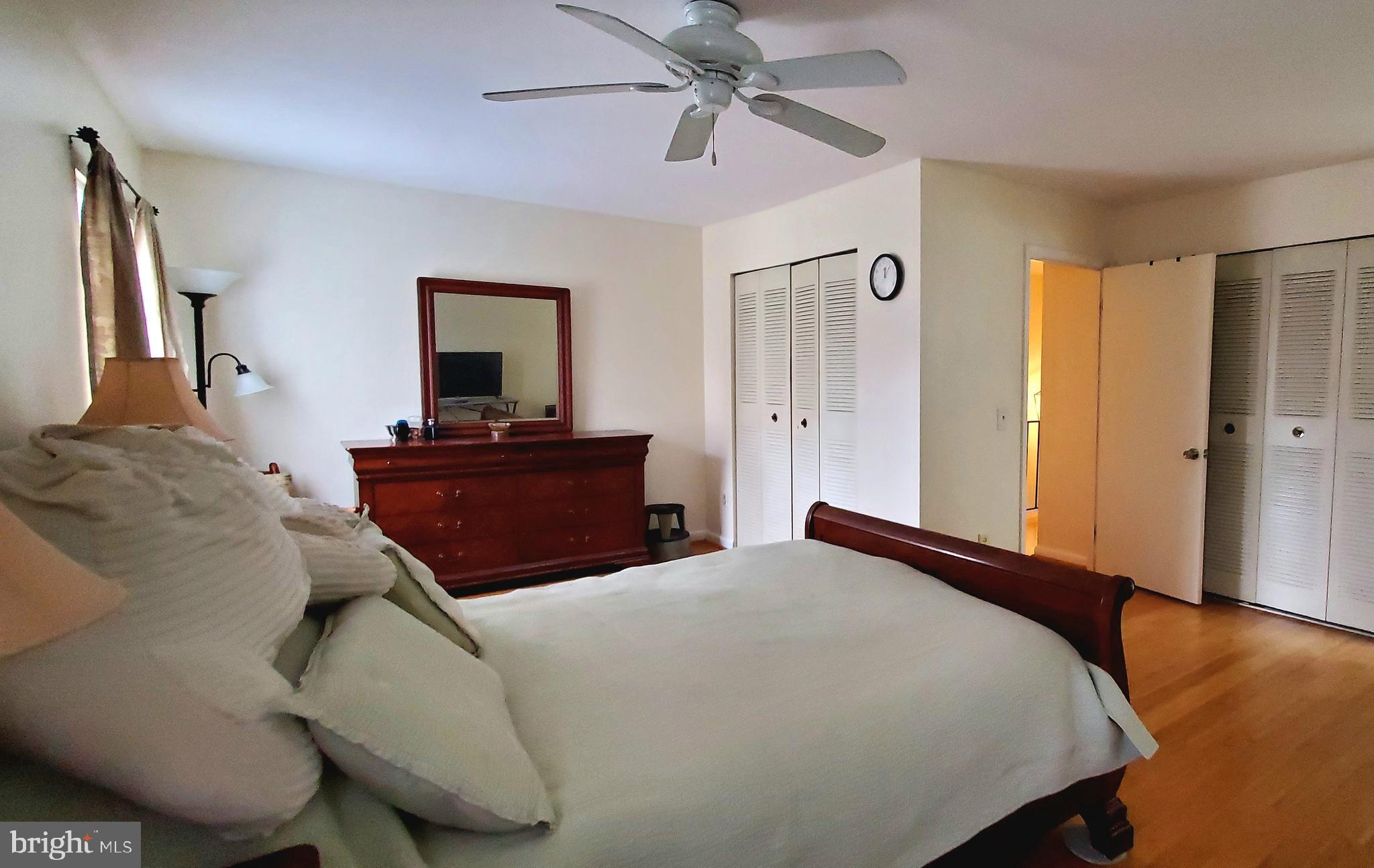 11712 Decade Court Reston, VA 20191 - Photo 10 of 18 PRIMARY BEDROOM WITH 2 CLOSETS AND PRIVATE BATH