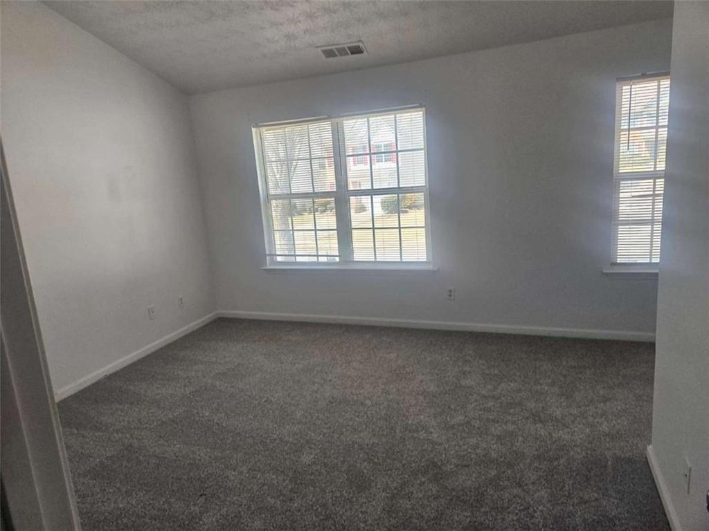 9432 Lakeview Road Union City, GA 30291 - Photo 5 of 10 an empty room with a window