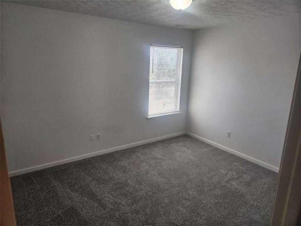 9432 Lakeview Road Union City, GA 30291 - Photo 7 of 10 an empty room with a window