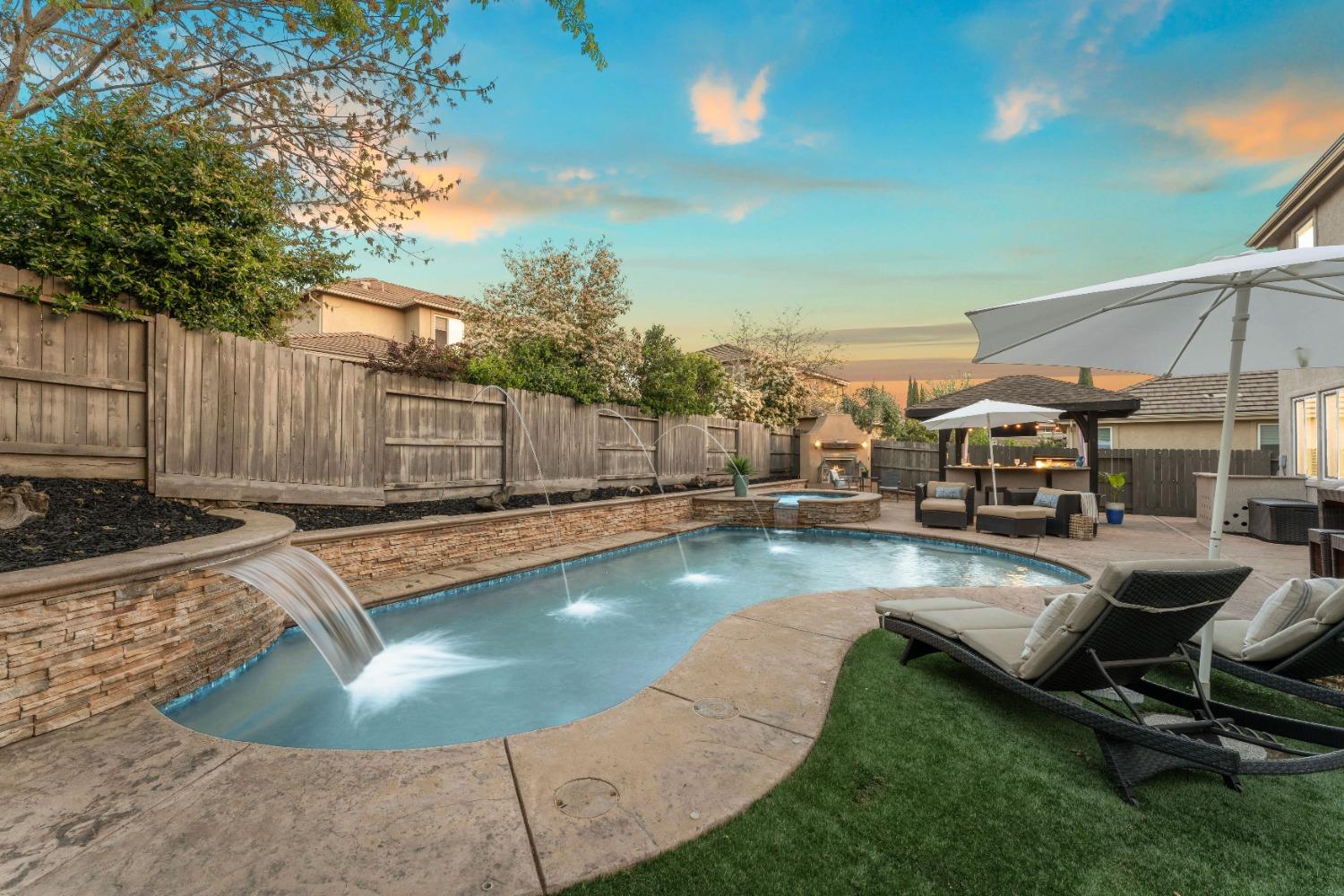 4095 David Loop El Dorado Hills, CA 95762 - Photo 1 of 1 a view of a swimming pool with chair and tables