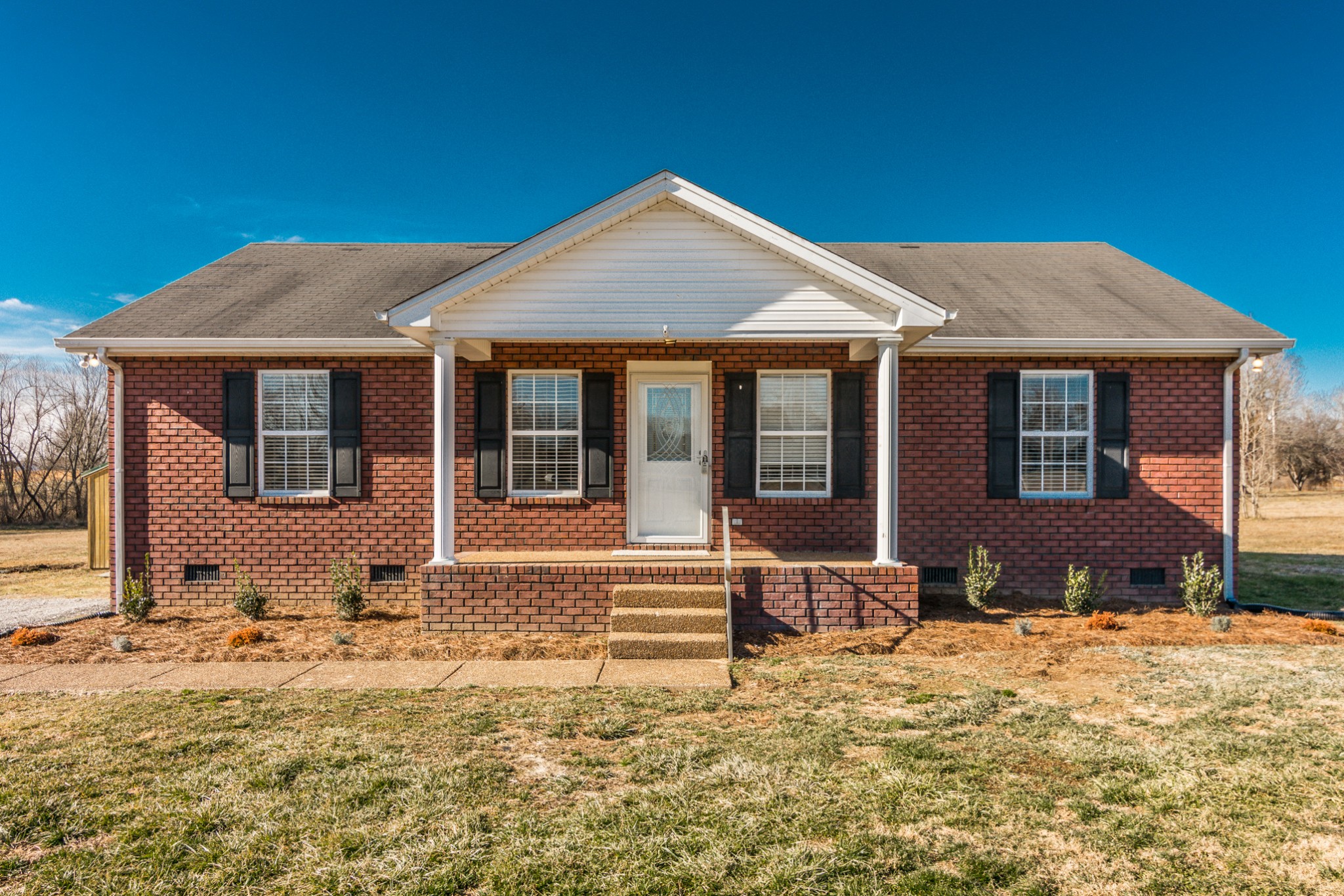 361 Corinth Road Portland, TN 37148 - Photo 1 of 46 a front view of a house with a yard