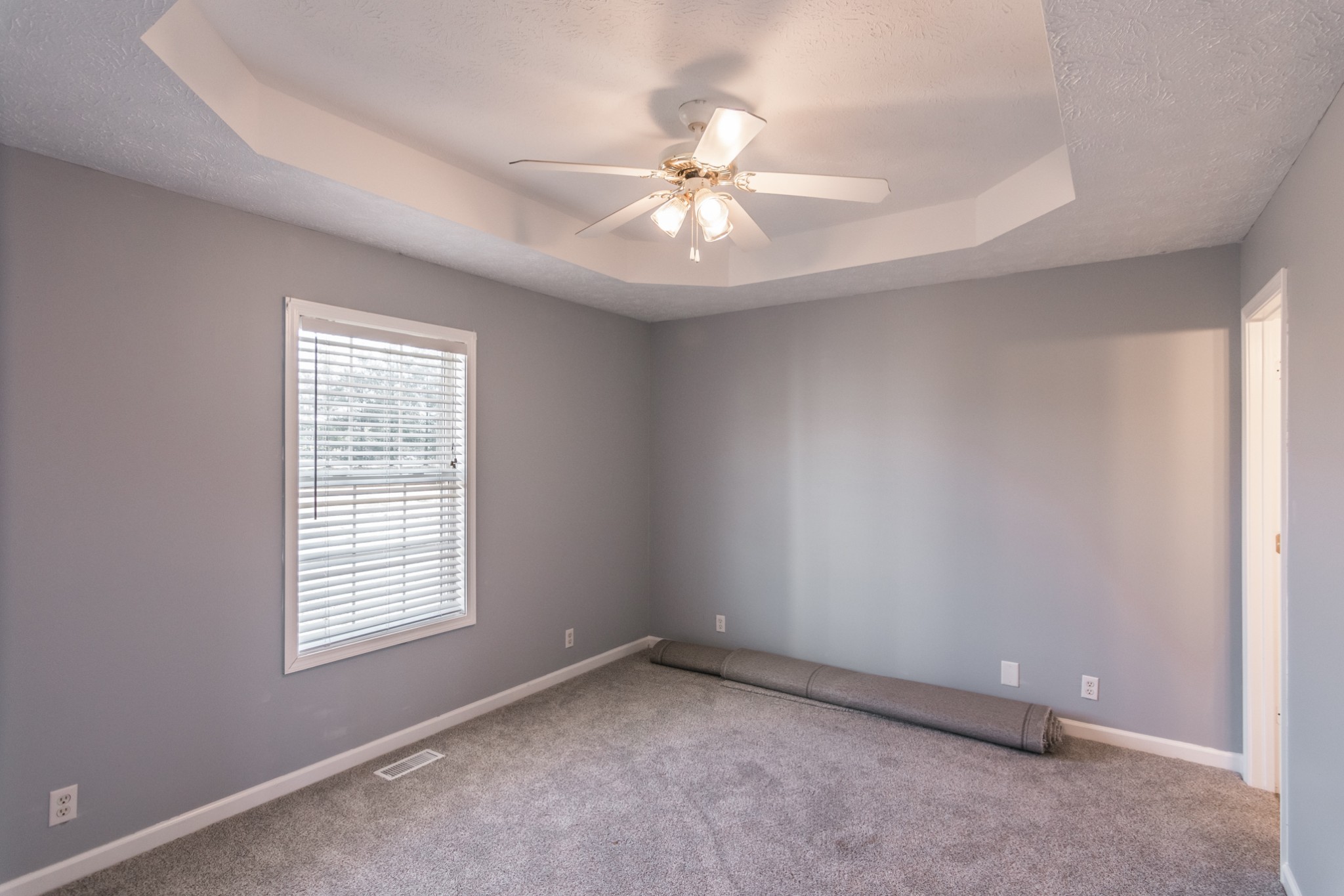 361 Corinth Road Portland, TN 37148 - Photo 21 of 46 an empty room with a window and a fan