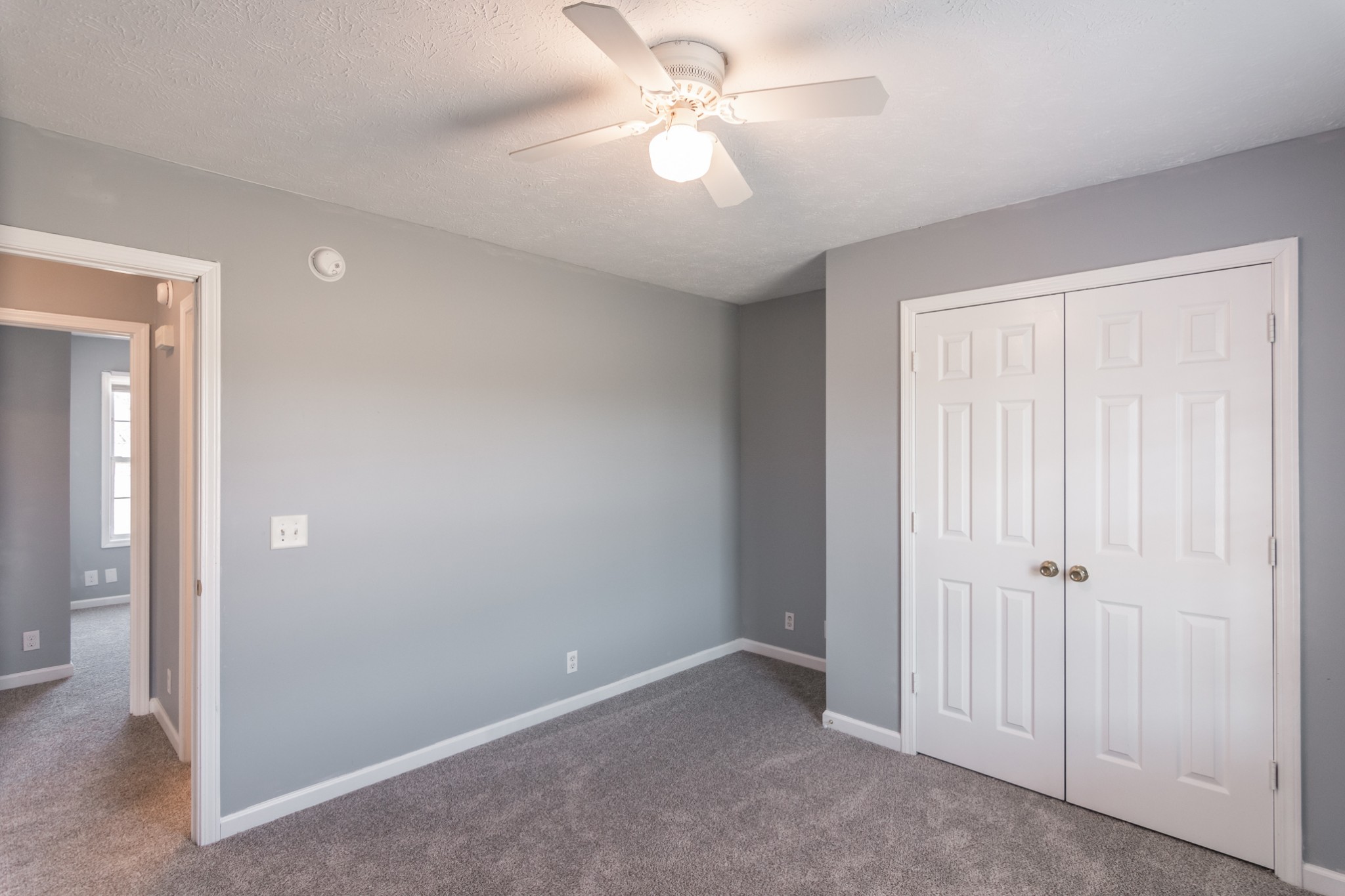 361 Corinth Road Portland, TN 37148 - Photo 30 of 46 an empty room with fan and a ceiling fan