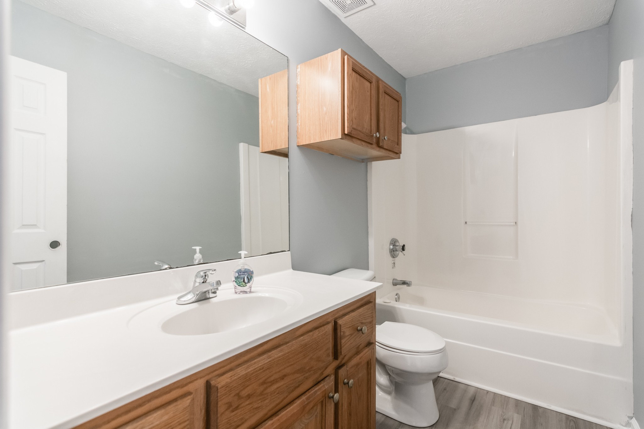 361 Corinth Road Portland, TN 37148 - Photo 31 of 46 a bathroom with a sink a toilet and shower