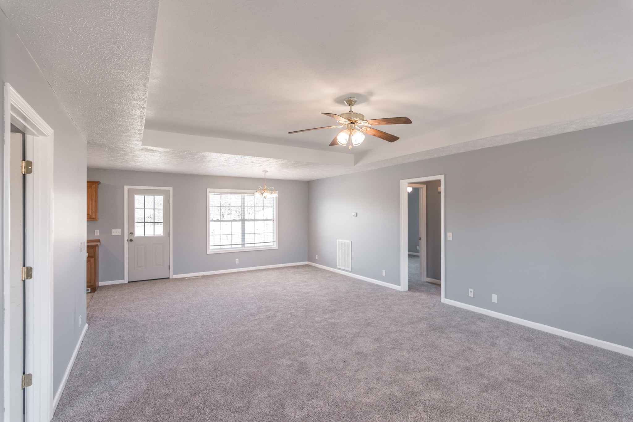 361 Corinth Road Portland, TN 37148 - Photo 8 of 46 a view of an empty room with a chandelier fan