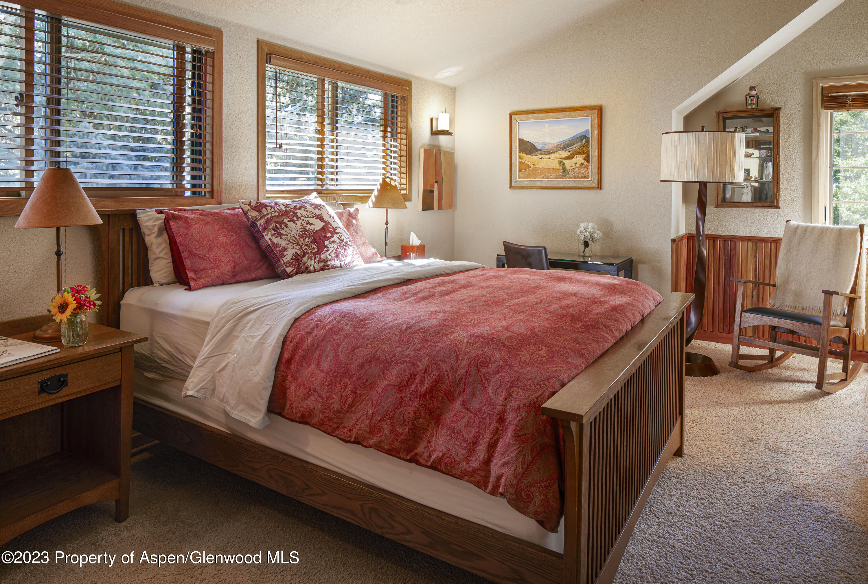135 Riverside Drive Basalt, CO 81621 - Photo 12 of 18 a bed sitting in a bedroom next to a window