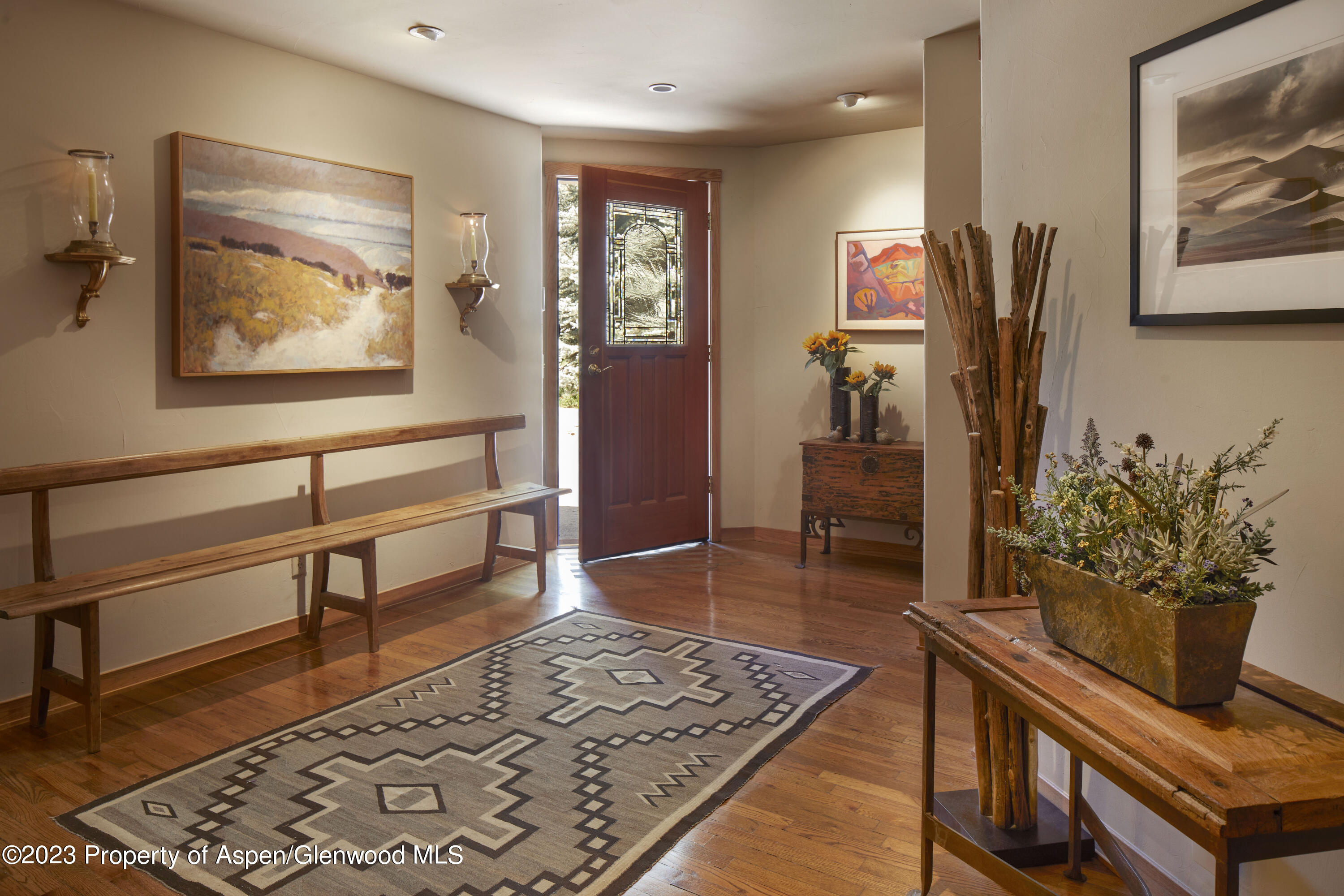 135 Riverside Drive Basalt, CO 81621 - Photo 6 of 18 a living room with furniture and wooden floor