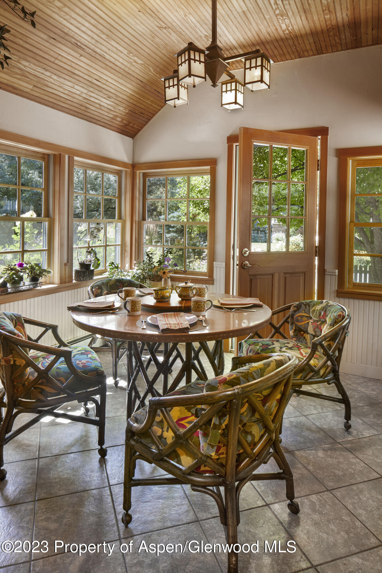 135 Riverside Drive Basalt, CO 81621 - Photo 8 of 18 a view of a dining room with furniture large windows and wooden floor