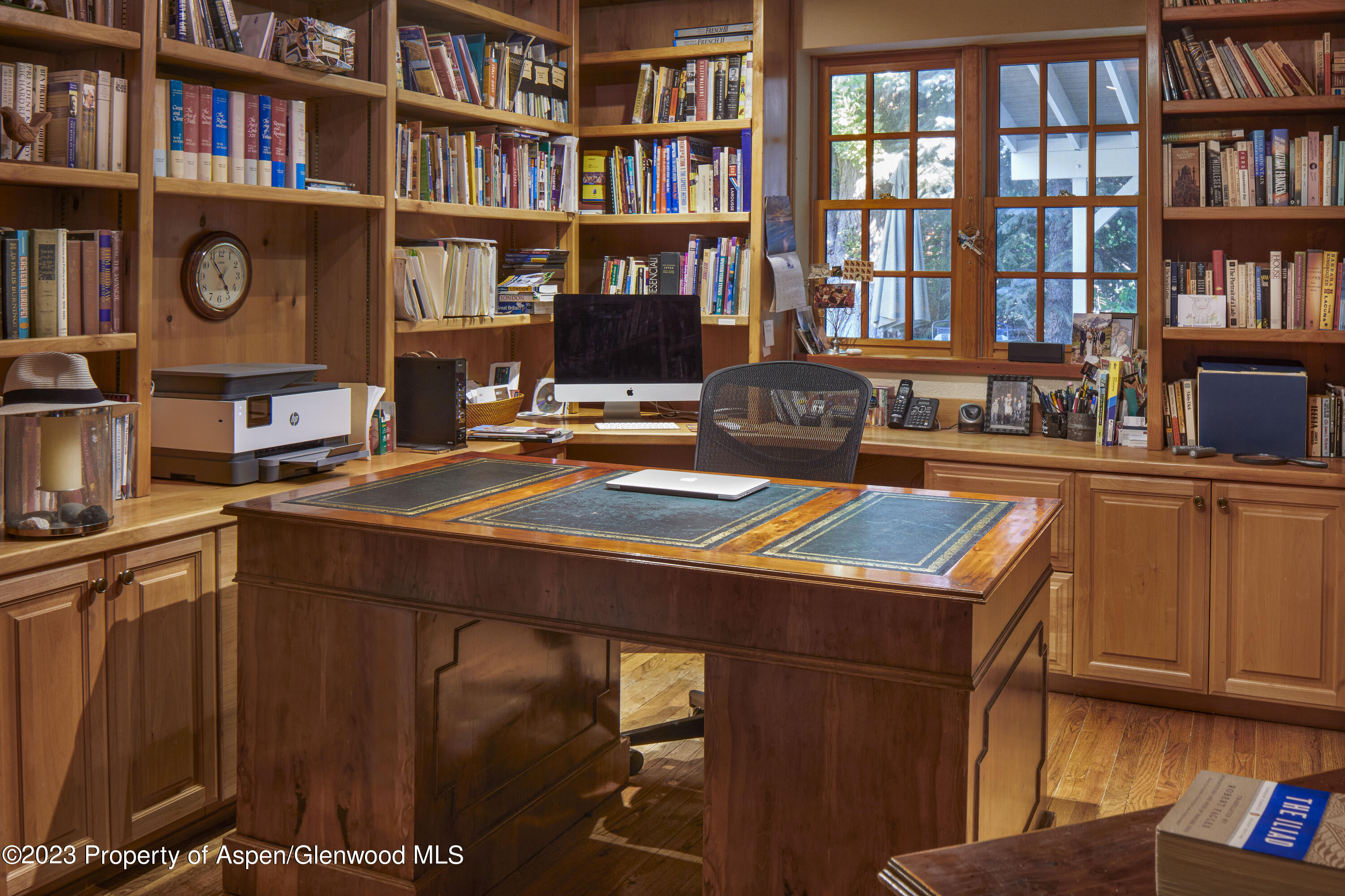 135 Riverside Drive Basalt, CO 81621 - Photo 10 of 18 a room with furniture and a book shelf