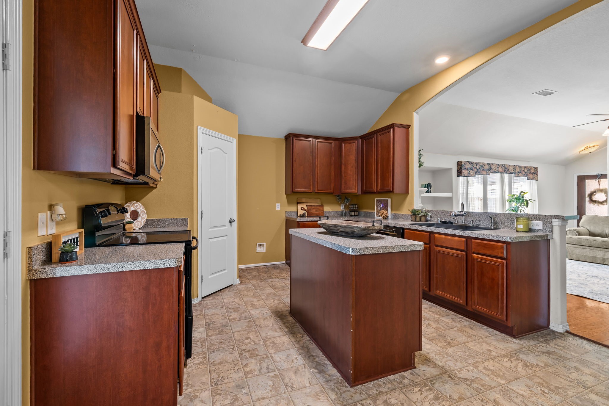 445 Decoster Boulevard Alvin, TX 77511 - Photo 10 of 32 Great open kitchen with a large island