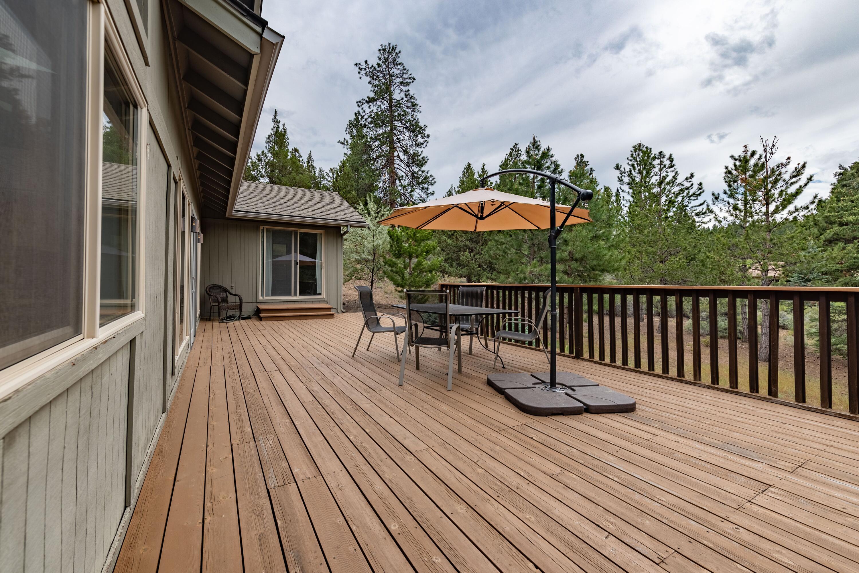2255 Northwest Putnam Road Bend, OR 97703 - Photo 32 of 49 The deck off the back of the home gets a lot of sun in the afternoons and evenings.