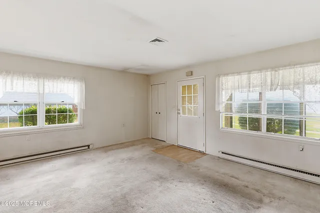 an empty room with a window