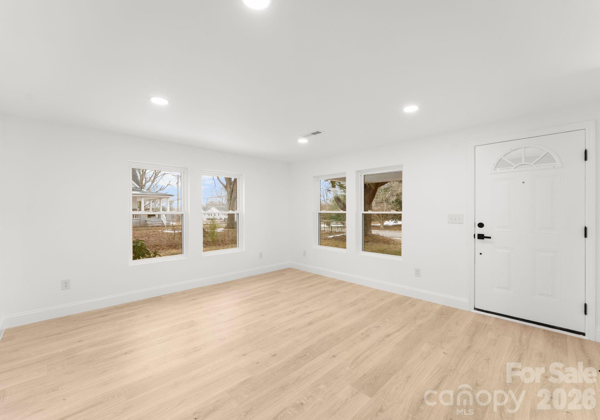 1413 Modena Street Gastonia, NC 28054 - Photo 8 of 27 a view of an empty room with a window
