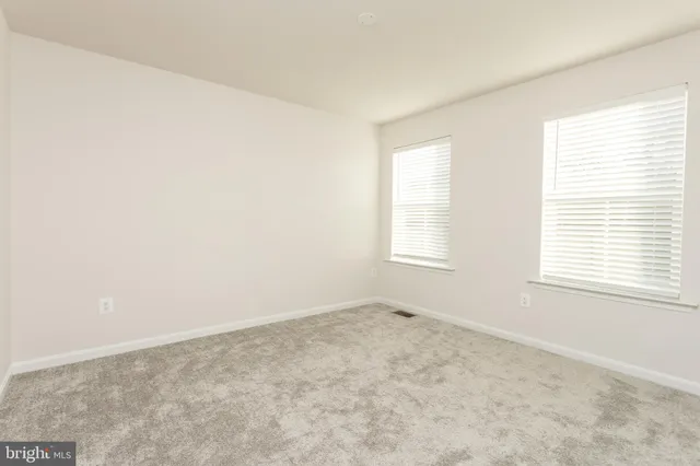a bathroom with a sink toilet and vanity