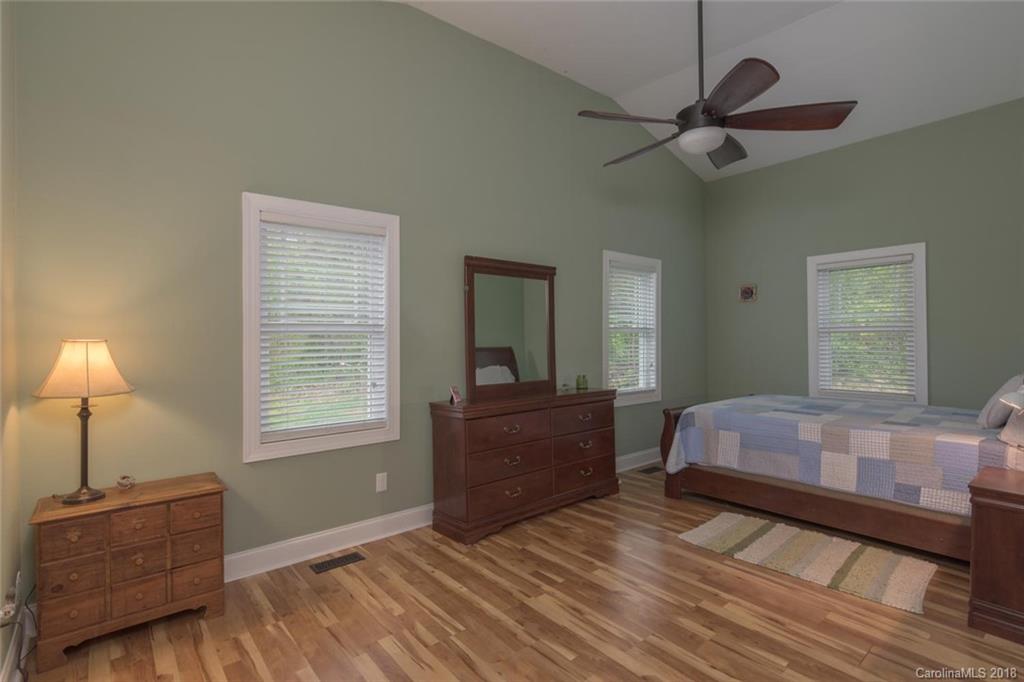 2500 Catawba River Road Old Fort, NC 28762 - Photo 12 of 24 a bedroom with a bed and window with lamp