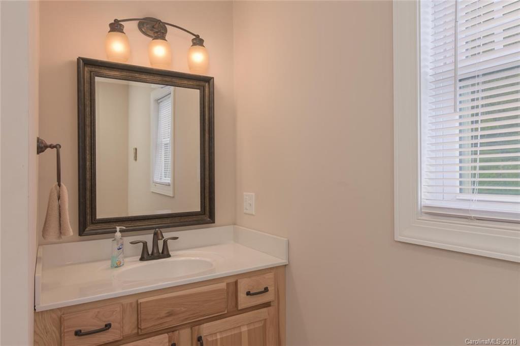 2500 Catawba River Road Old Fort, NC 28762 - Photo 15 of 24 a bathroom with a sink and a mirror
