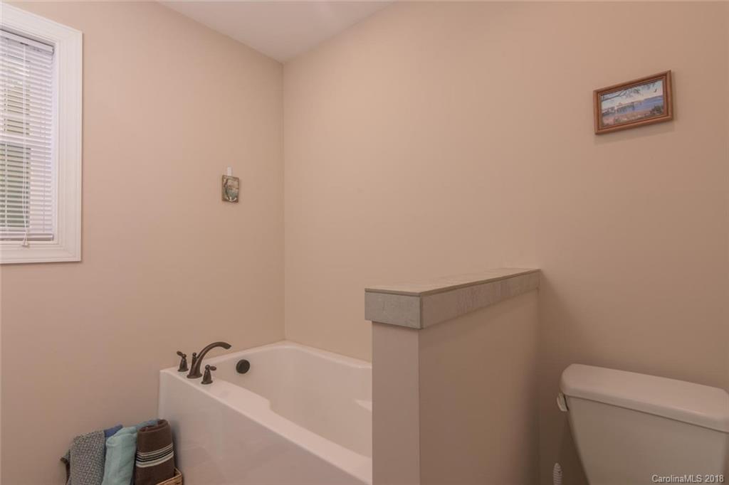 2500 Catawba River Road Old Fort, NC 28762 - Photo 16 of 24 a white toilet sitting next to a bath tub