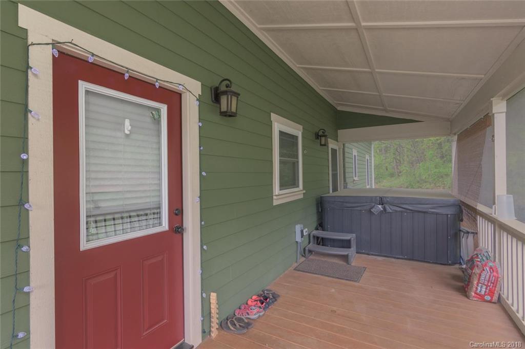 2500 Catawba River Road Old Fort, NC 28762 - Photo 20 of 24 a backyard of a house with barbeque oven