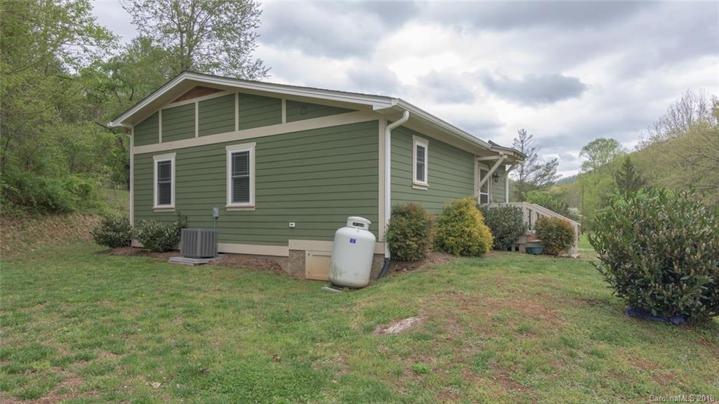 2500 Catawba River Road Old Fort, NC 28762 - Photo 22 of 24 a front view of a house with garden