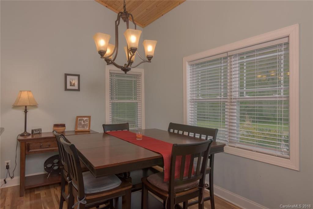 2500 Catawba River Road Old Fort, NC 28762 - Photo 5 of 24 a view of a dining room with furniture and wooden floor